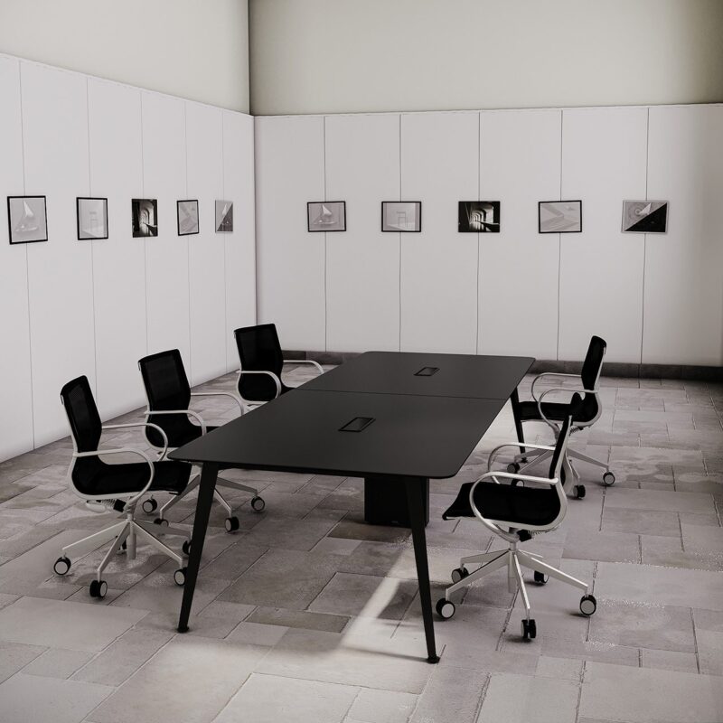 Image of a Meeting Table with swivel chairs in an office meeting room