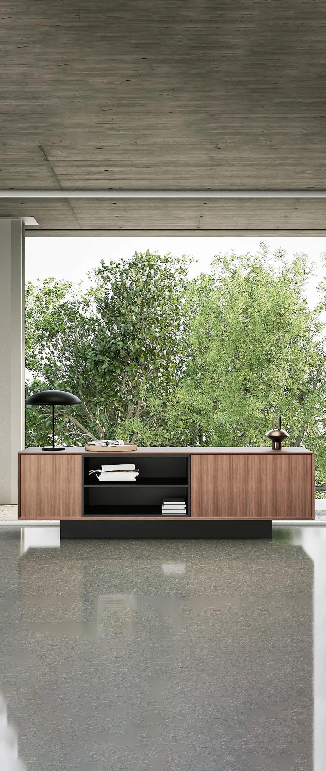 Modern wood and black drawer cabinet with open shelves, books, and decor, set against a bright window.